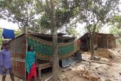 A adivasi woman onfron of her tamporary house001